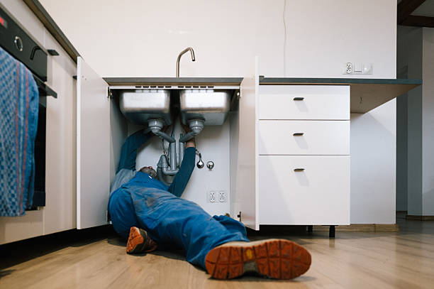 Professional Emergency Plumber technician working in McLoud, OK